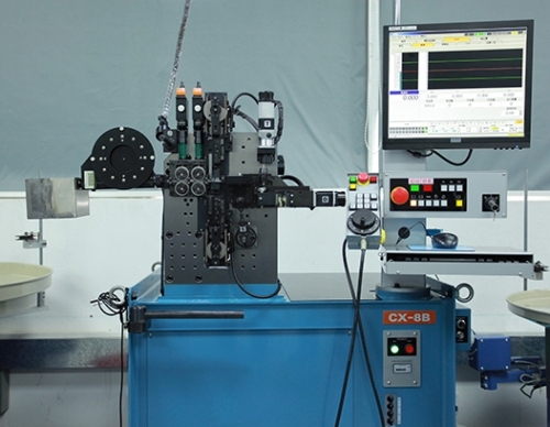 Japanese spring compression machine