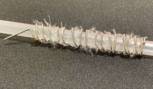 Embolized coil (flocking is available)